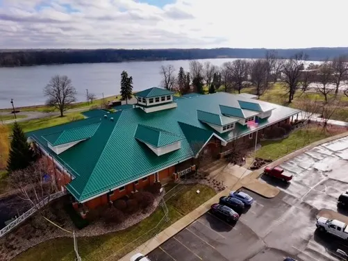 Tarping and dry-in on a Avian Glen commercial roof